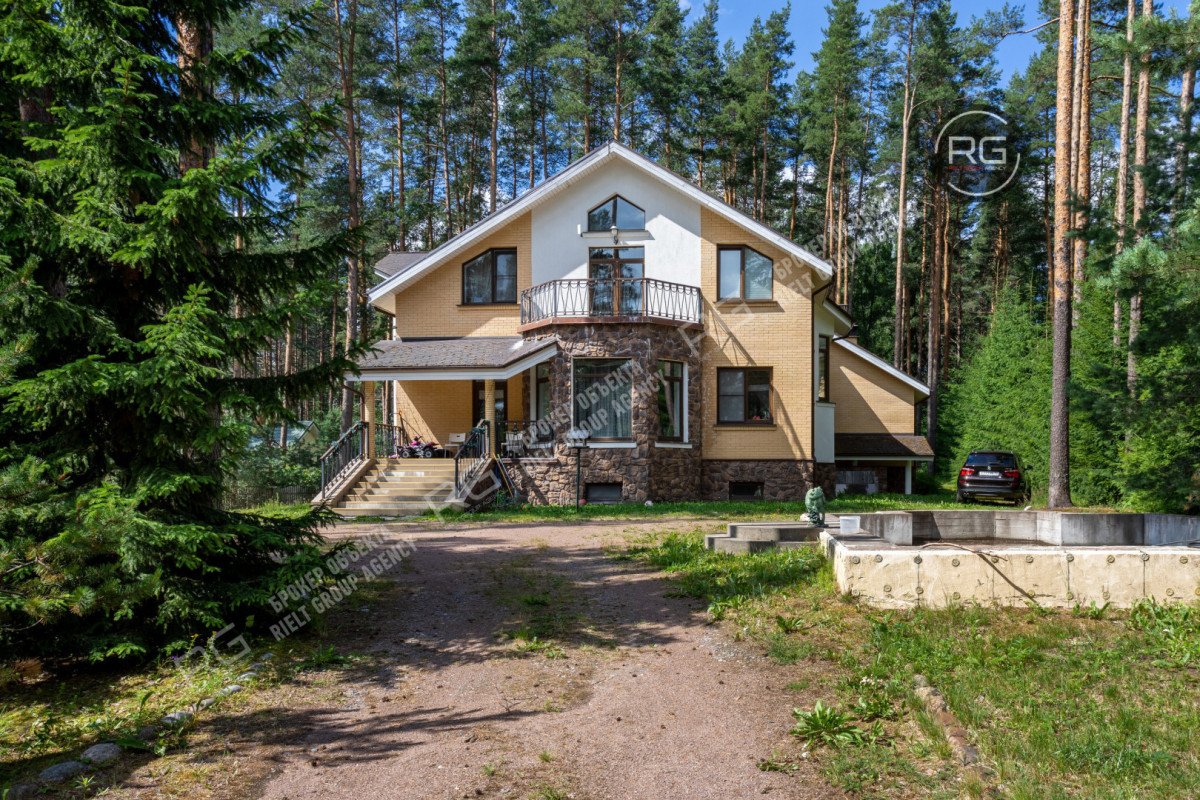 Фото 1, Загородный дом в сосновом лесу, 453 м², Ленинградская область, Всеволожский район, 34 км Приозерского шоссе тер., д.31